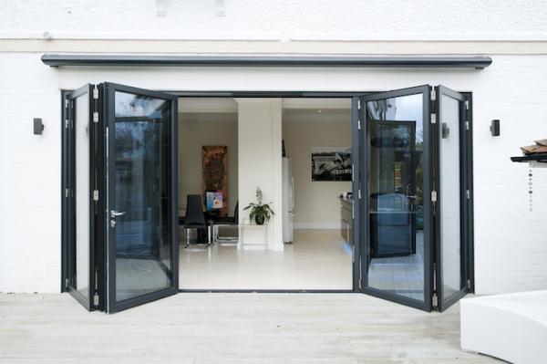 4 part bi folding door set, sprayed in a Grey / Black (Ral 7021 helps deliver the modern and contemporary space that our customer required
